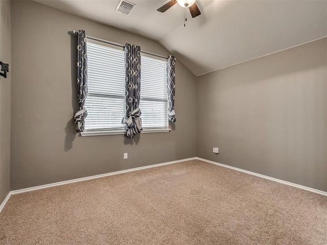 additional living space featuring vaulted ceiling, ceiling fan, and carpet flooring