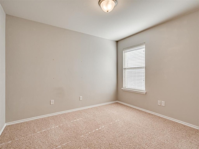 spare room with carpet flooring