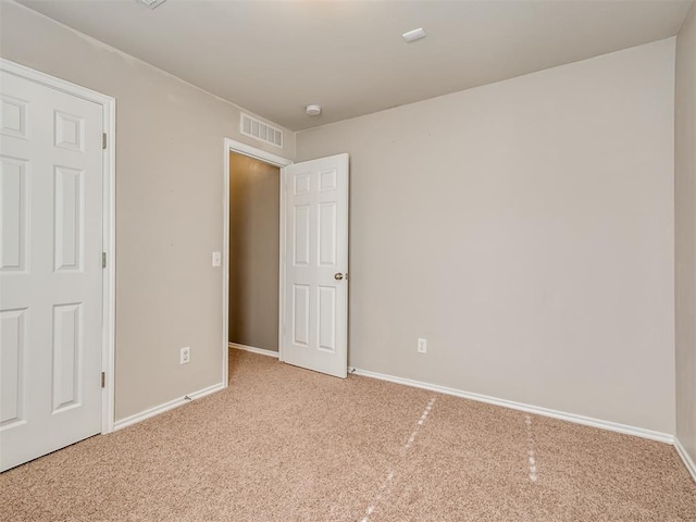 unfurnished bedroom featuring carpet flooring