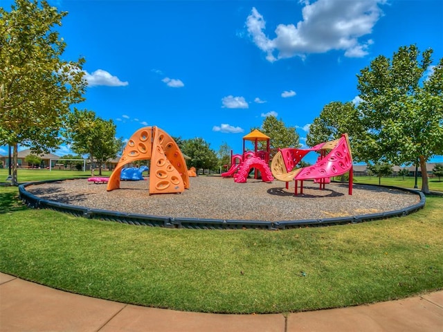 view of playground featuring a lawn