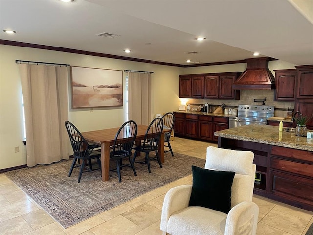 dining space featuring recessed lighting, visible vents, crown molding, and light tile patterned floors