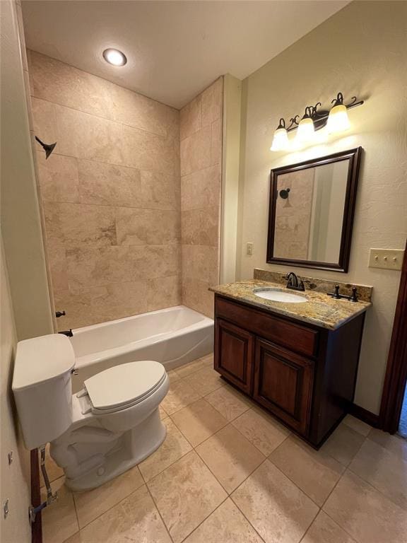 bathroom with shower / bathing tub combination, tile patterned floors, vanity, and toilet