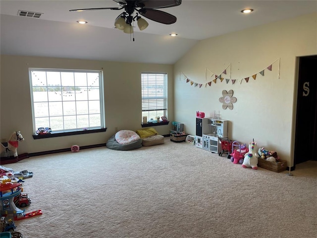 rec room featuring recessed lighting, lofted ceiling, visible vents, a ceiling fan, and carpet floors