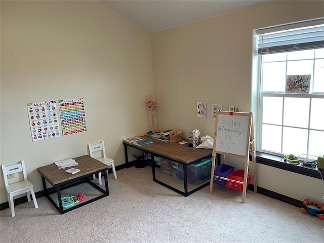 office space featuring baseboards and carpet