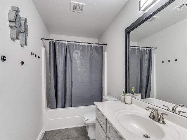 full bathroom featuring vanity, shower / bath combination with curtain, and toilet