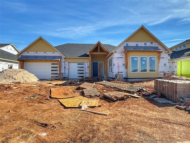 property under construction featuring an attached garage