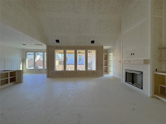 unfurnished living room featuring a fireplace