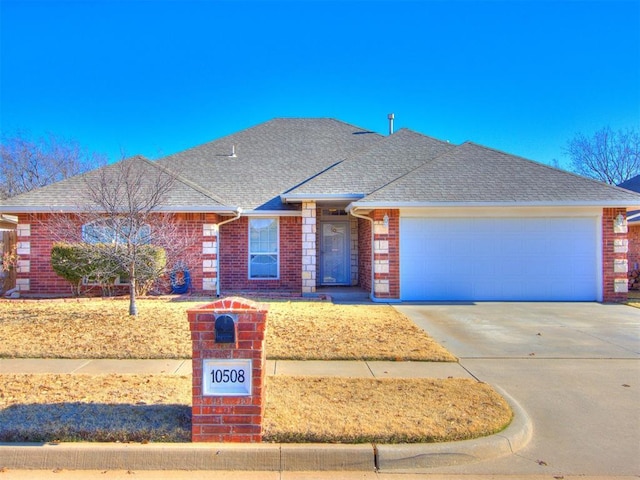 single story home with a garage