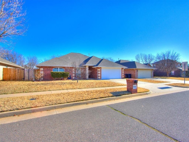 single story home featuring a garage