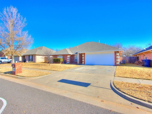 ranch-style home with a garage