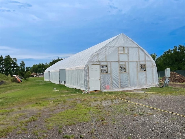 view of outdoor structure featuring a yard