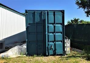 entry to storm shelter with an outdoor structure