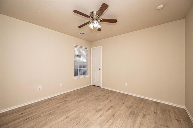 unfurnished room featuring ceiling fan and light hardwood / wood-style flooring