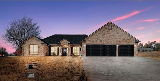 view of front of property with a garage