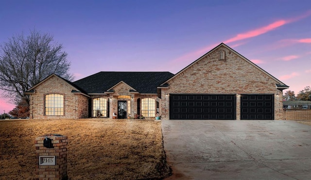 view of front of house with a garage