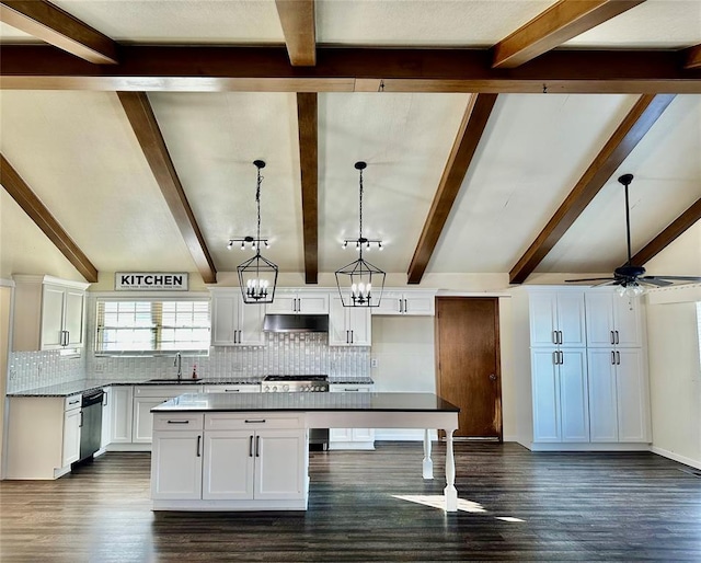 kitchen with light stone countertops, ceiling fan with notable chandelier, sink, decorative light fixtures, and white cabinetry