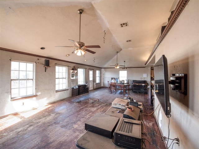 living room with dark hardwood / wood-style floors, ceiling fan, and lofted ceiling