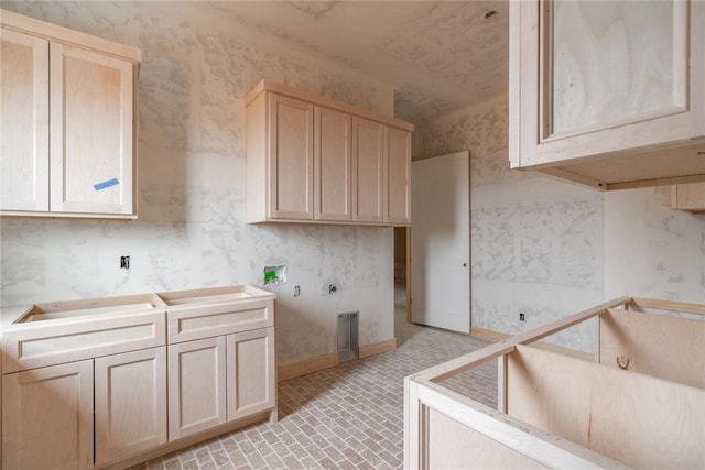 kitchen with light brown cabinetry