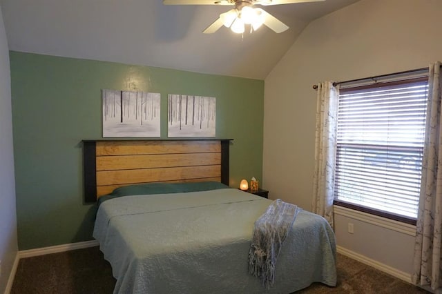 carpeted bedroom featuring ceiling fan and lofted ceiling