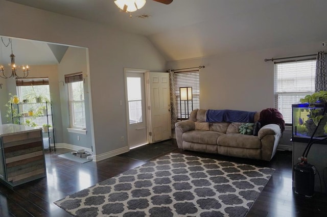 living room featuring dark hardwood / wood-style floors, plenty of natural light, and lofted ceiling