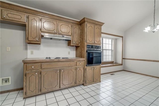 kitchen featuring gas cooktop, vaulted ceiling, pendant lighting, a chandelier, and black oven