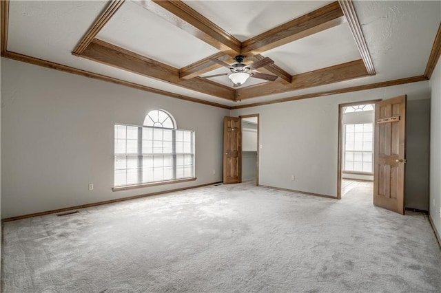 unfurnished room featuring carpet flooring, a wealth of natural light, and coffered ceiling