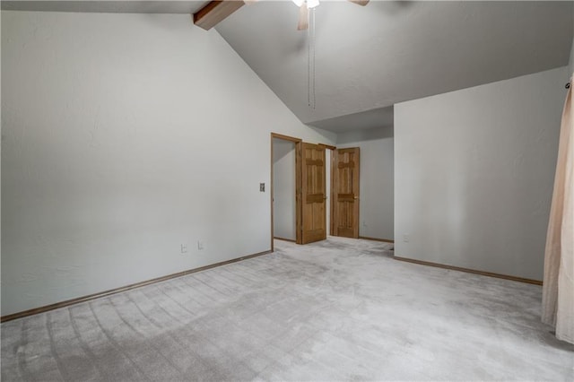 spare room featuring light carpet, beamed ceiling, high vaulted ceiling, and ceiling fan