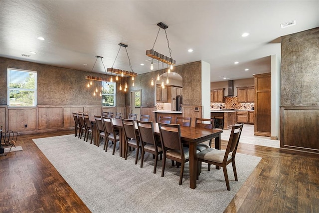 dining area featuring dark hardwood / wood-style flooring