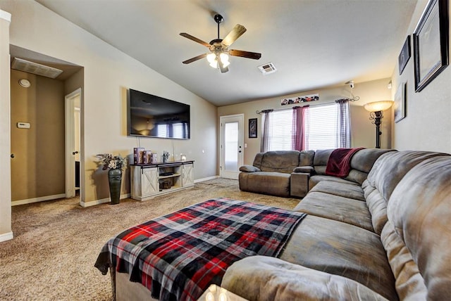 carpeted living room featuring vaulted ceiling and ceiling fan