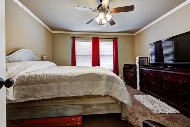 carpeted bedroom featuring ceiling fan and ornamental molding