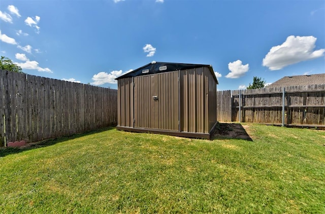 view of yard with a storage shed