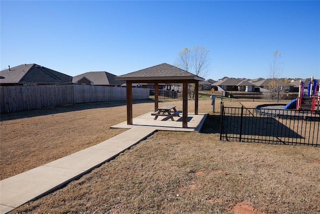 exterior space featuring a gazebo and a yard