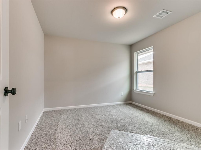 spare room with carpet flooring