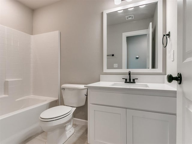 full bathroom with vanity, toilet, and washtub / shower combination