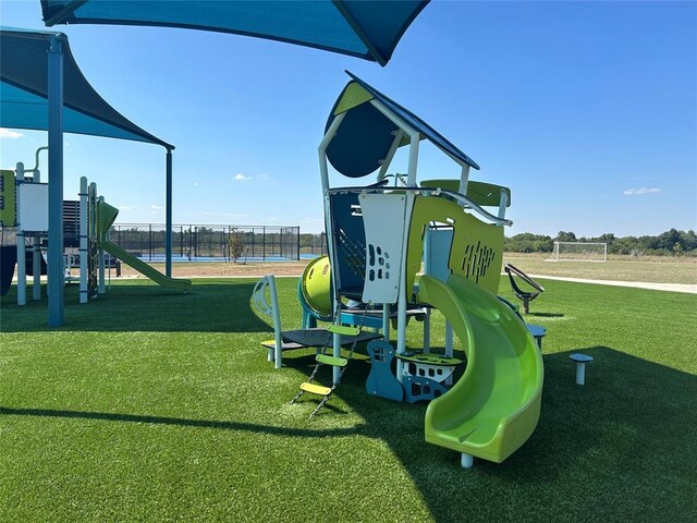 community play area featuring fence