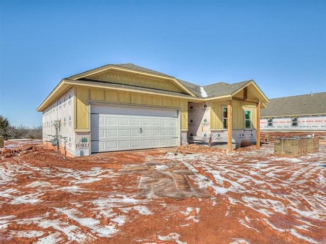 property under construction featuring a garage