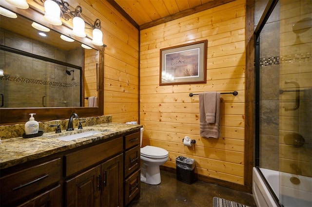 full bathroom featuring wooden ceiling, concrete floors, shower / bath combination with glass door, wooden walls, and vanity