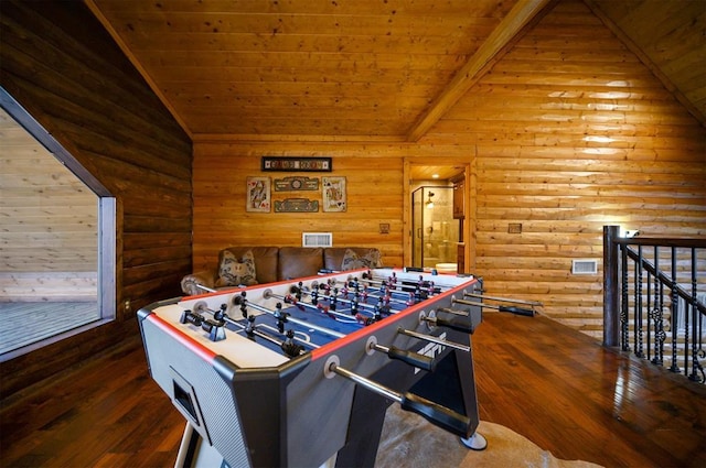 game room with beam ceiling, wood-type flooring, wood ceiling, and log walls