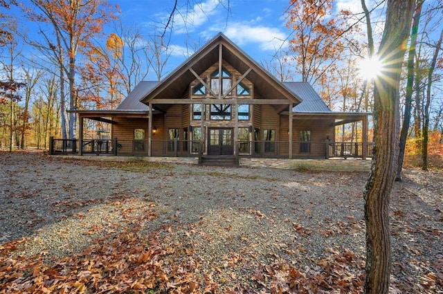 log home featuring french doors