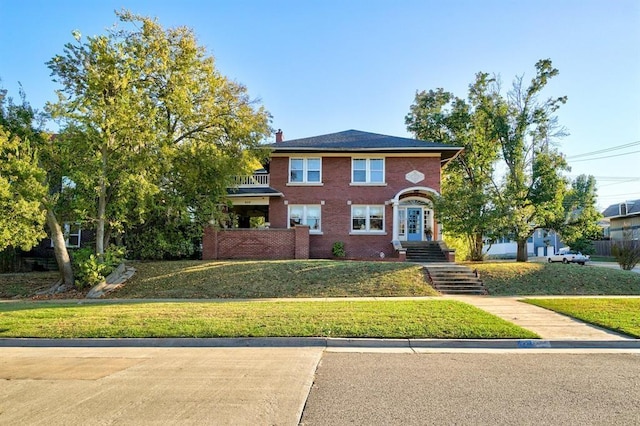 view of front facade featuring a front yard