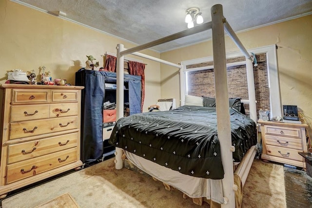 bedroom featuring dark carpet and ornamental molding