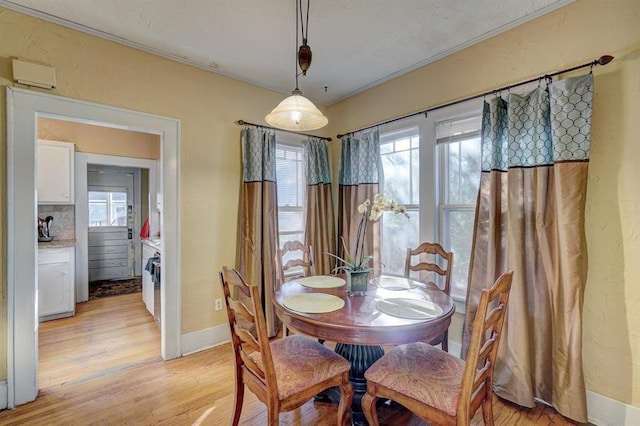 dining room with light wood-type flooring