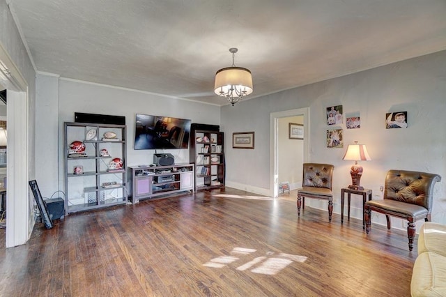 living room featuring wood-type flooring and a chandelier