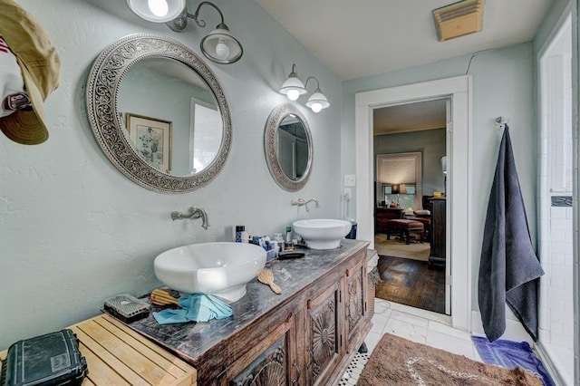 bathroom featuring vanity and hardwood / wood-style flooring