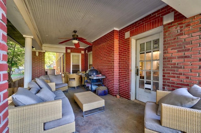 view of patio with covered porch, grilling area, and ceiling fan