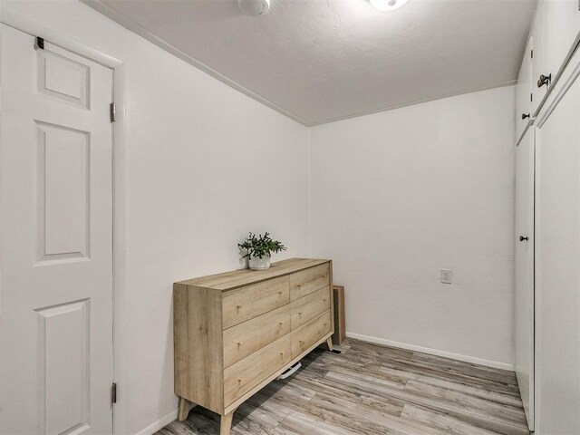 hallway featuring light wood-type flooring