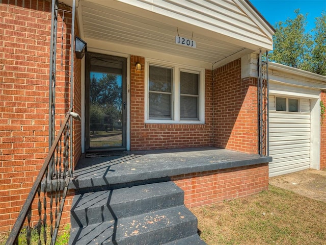 property entrance featuring covered porch