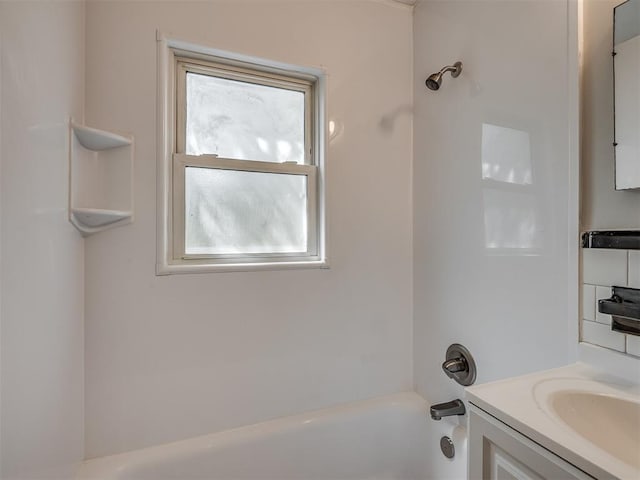 bathroom with vanity and shower / bathtub combination