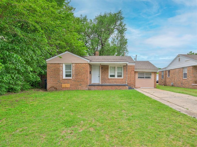 ranch-style home with a front lawn