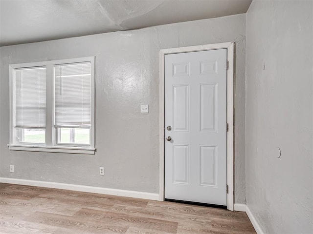 entryway with light hardwood / wood-style flooring